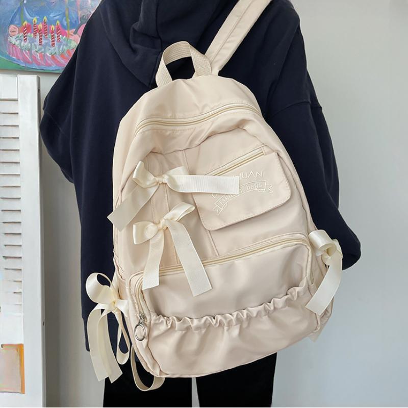 Милые школьные сумки с бантом для колледжа, контрастные нейлоновые рюкзаки для учеников младших классов средней школы, большая вместимость, сумка через плечо для девочек-подростков