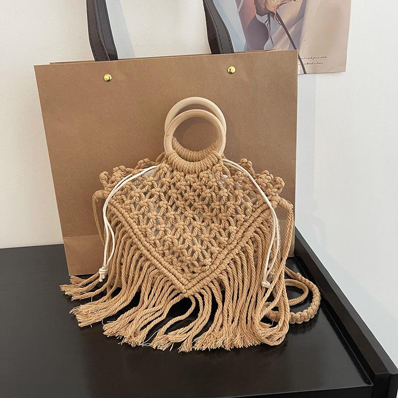 Bohemian fringed portable small bag women's 2025 new spring and summer hollow shoulder woven bag crossbody straw bag