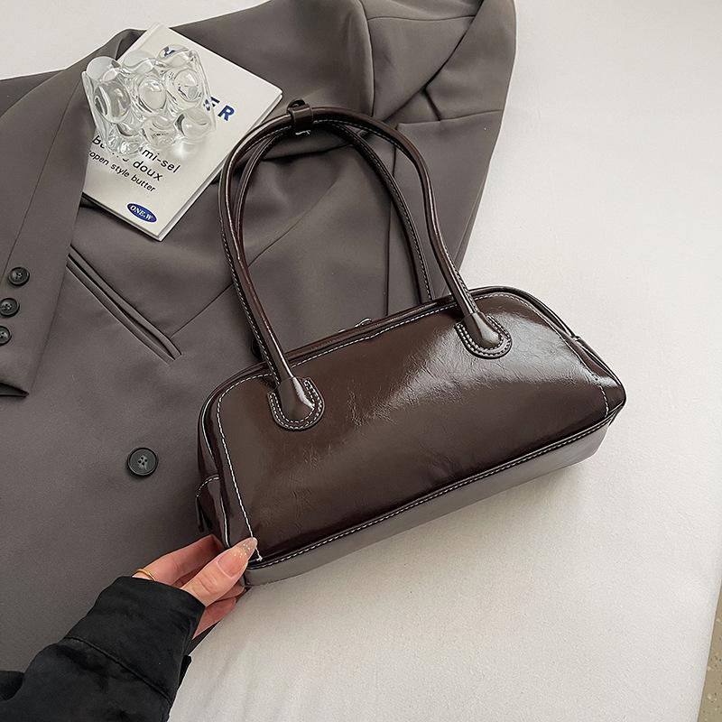 Простая сумка интернет-знаменитости 2025 новая модная осенне-зимняя на плечо женская сумка с высоким чувством подмышечная универсальная сумка-бостон тренд