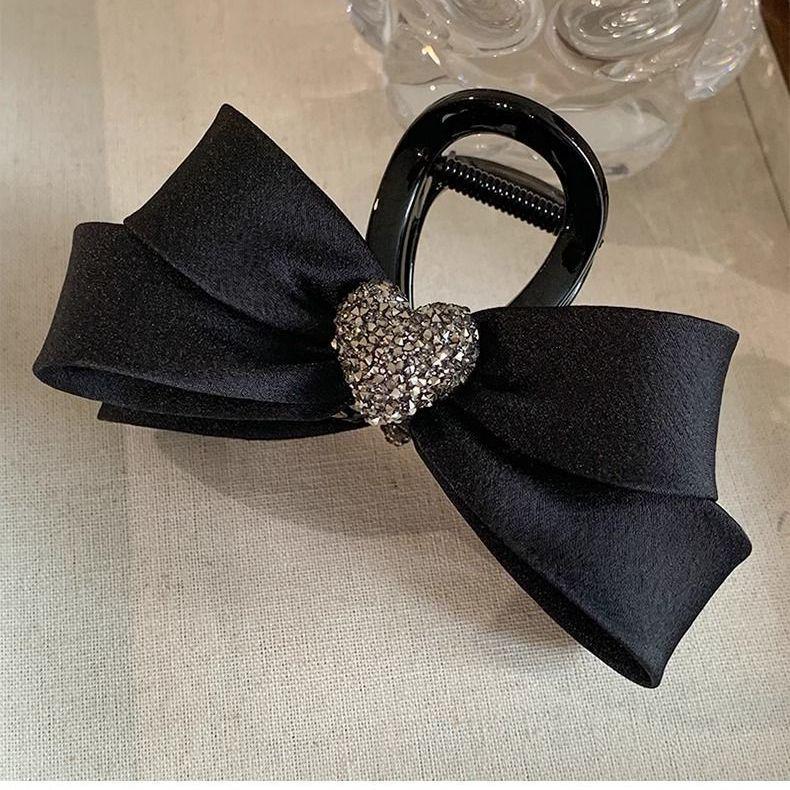 Элегантный черный зажим-коготь с кристаллами в форме сердца и бантом - Средний темперамент, стиль акулы, 2025