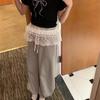 Модная кружевная юбка-фартук с несколькими завязками и подолом в виде полушторы