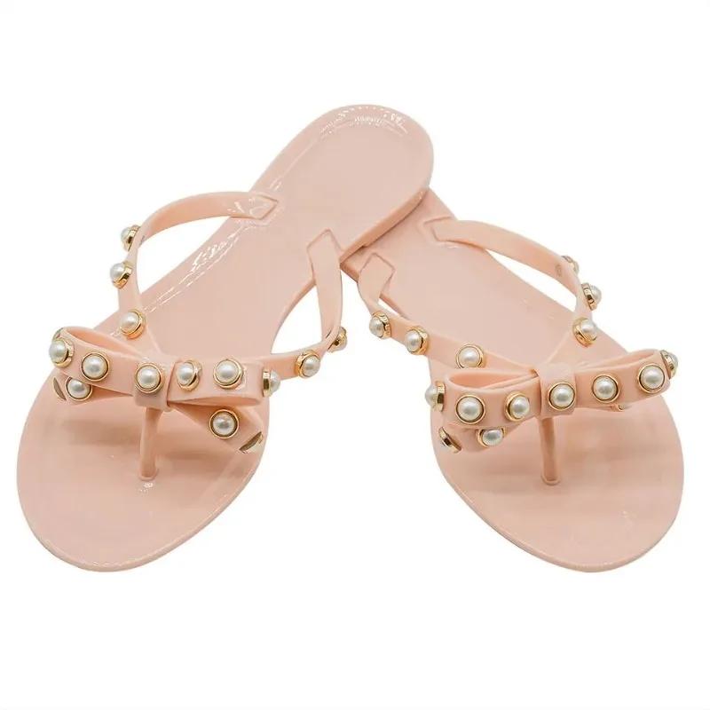 Тапочки женские шлепанцы лето снаружи 2024 новые женские сандалии с бабочкой и елочкой жемчужные тапочки желейные пляжные туфли 41