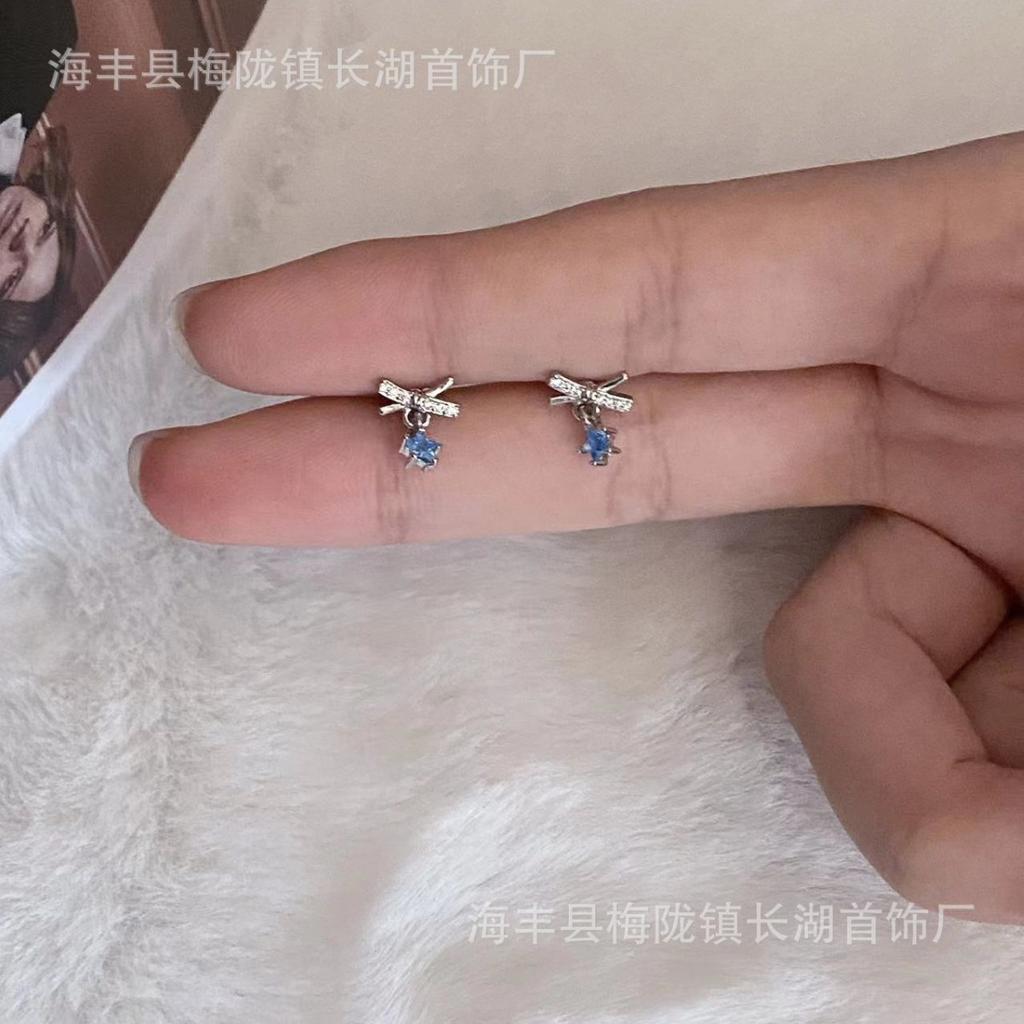 screw earbone nails, blue zircon bow cochlear earrings, women's niche simple personality versatile temperament earrings