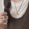 2024 Women's Black Leather Rope Necklace: Korean Croissant Clavicle Chain for Sweaters, Versatile and Elegant.