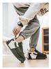 Мужские модные кроссовки в стиле 'Dad Shoes' из тисненой кожи с толстой амортизирующей подошвой на весну 2025 года