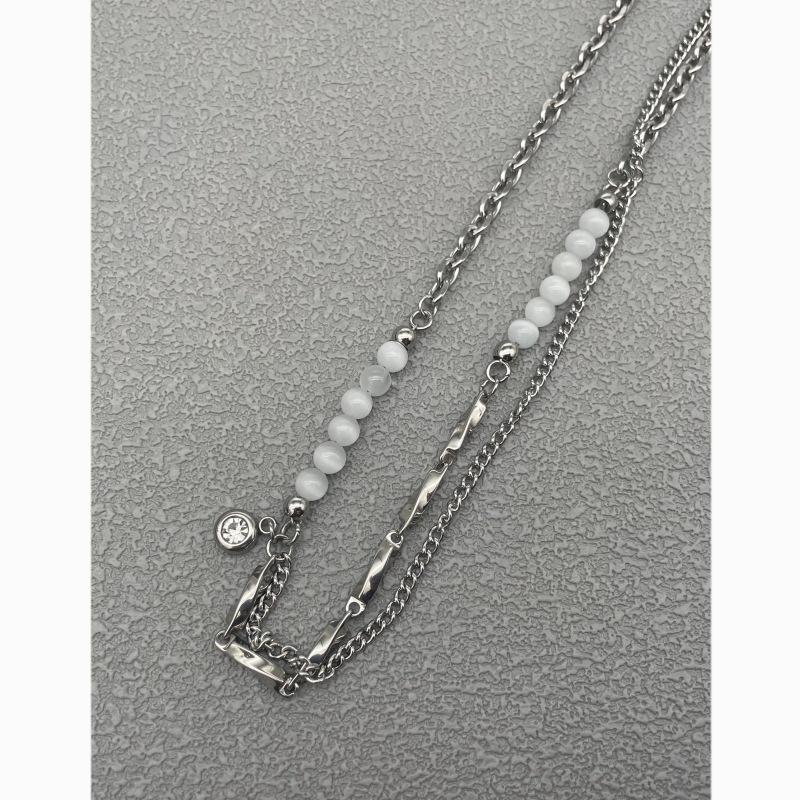 Gage Niche Women's Titanium Steel Necklace with Cat's Eye Stone and Clavicle Chain Trend.