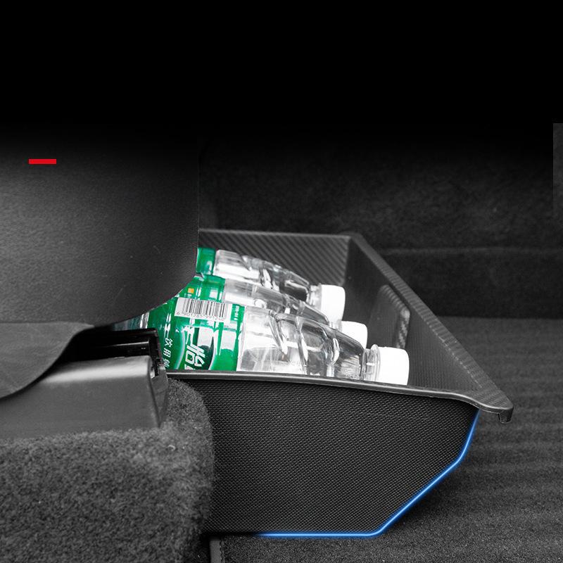 Скрытый ящик для хранения вещей под сиденьем Tesla Model Y