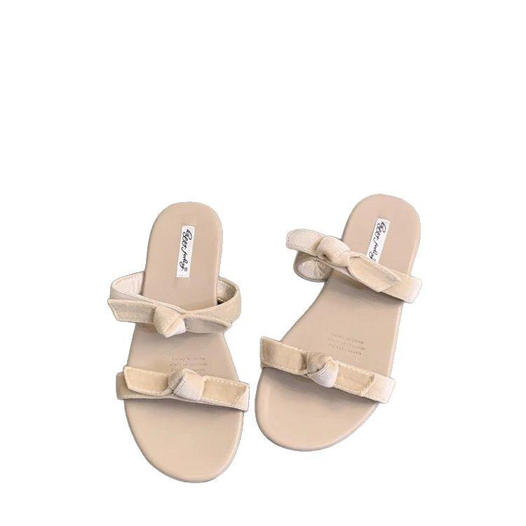 Сланцы Xiaoxiangfeng на плоской подошве с бантом женские 2025 новая нишевая модель с открытым носком повседневные пляжные крутые сланцы