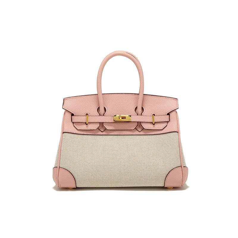 Весна 2025 г. Женская сумка через плечо из кожи и холста контрастного цвета