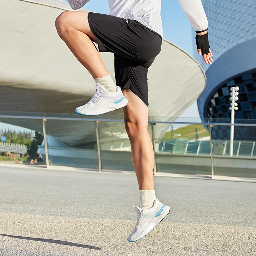 Li-Ning Быстросохнущие прохладные дышащие однотонные эластичные тканые шорты для фитнеса мужские шорты черного цвета AKSU693-1