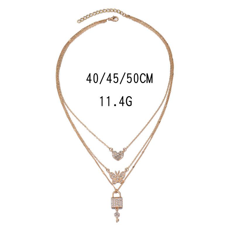 Butterfly love necklace European and American new personalized jewelry key pendant multi-layer women's street shot crystal sweater chain