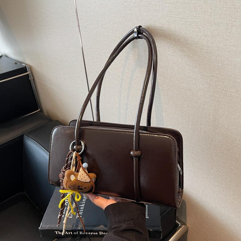 Ретро сумка женская большой вместимости 2025 новая осень и зима универсальная на плечо подмышку сумка повседневная текстура деловая сумка-подушка