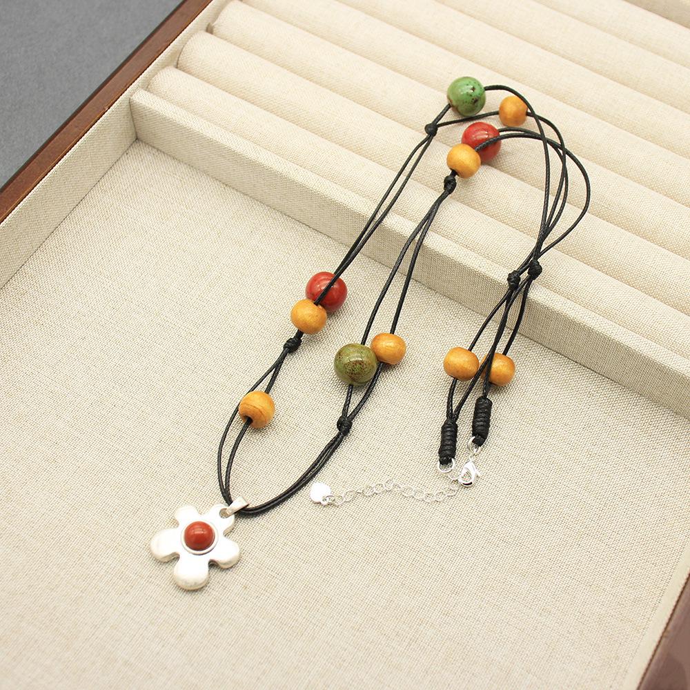 Керамическое ожерелье с фруктами и карибским цветком и серьги с красным камнем