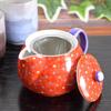 Stylish Kutani ware teapot with a vermilion arabesque pattern. Made in Japan. Includes tea strainer.
