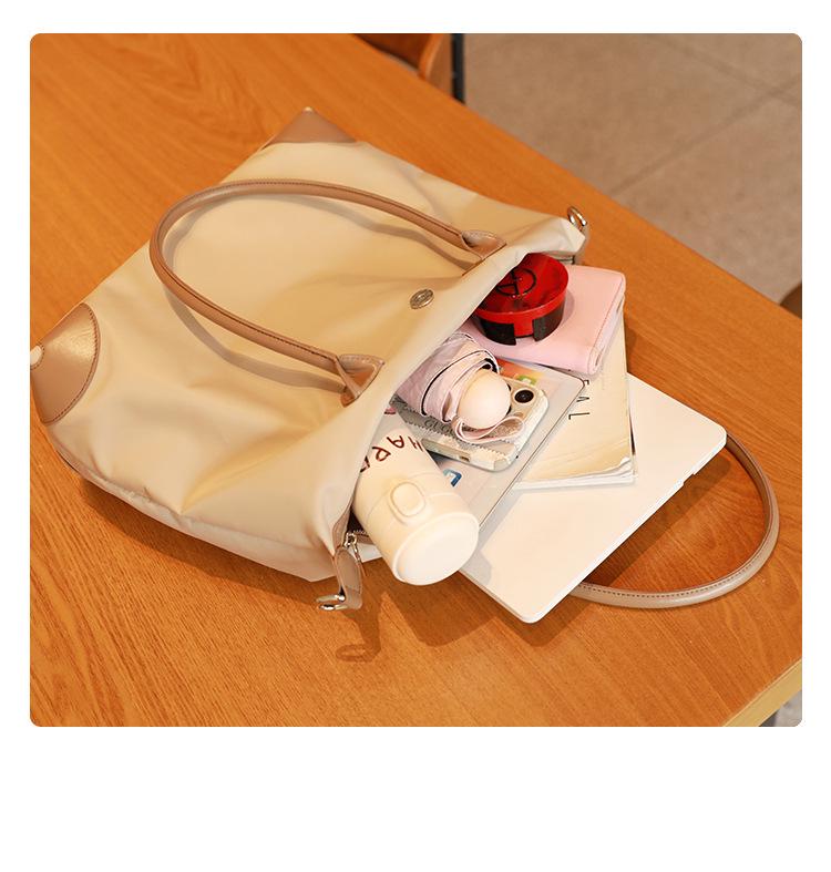 Simple Casual Women's Dumpling Handbag: High-End, Large Capacity, Crossbody & Commute Bag