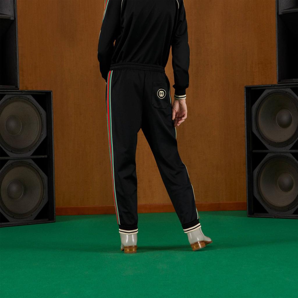 Gucci Спортивные брюки из технического джерси 698426-XJEES-1152