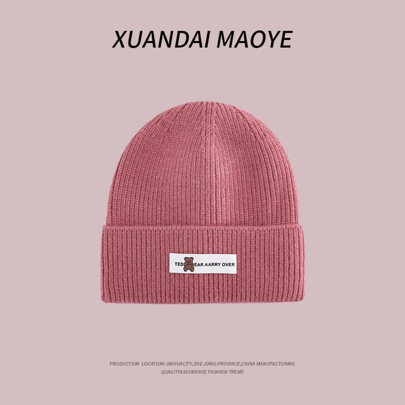 Осенние и зимние шапки женские плюшевые новые вязаные шапки универсальные теплые защитные наушники шерстяные утолщенные модные студенческие шапки