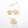 European and American women's necklace earrings set versatile flower inlaid pearl design niche long collarbone chain