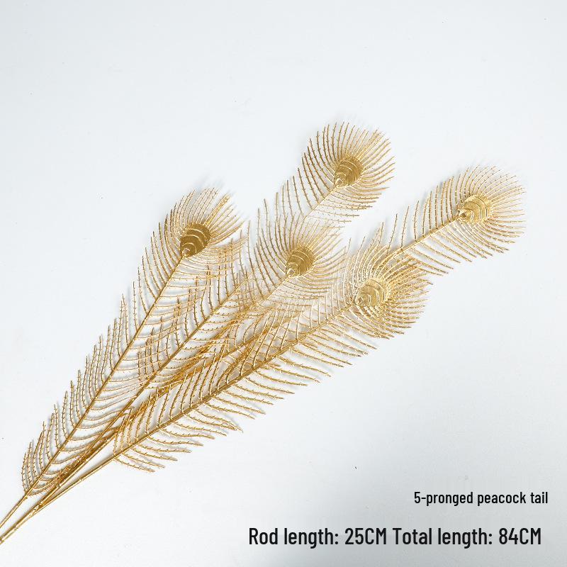 New Year Floral Arrangement with Golden Eucalyptus, Fan Leaf, Simulated Holly, Ginkgo, and Golden Leaf.
