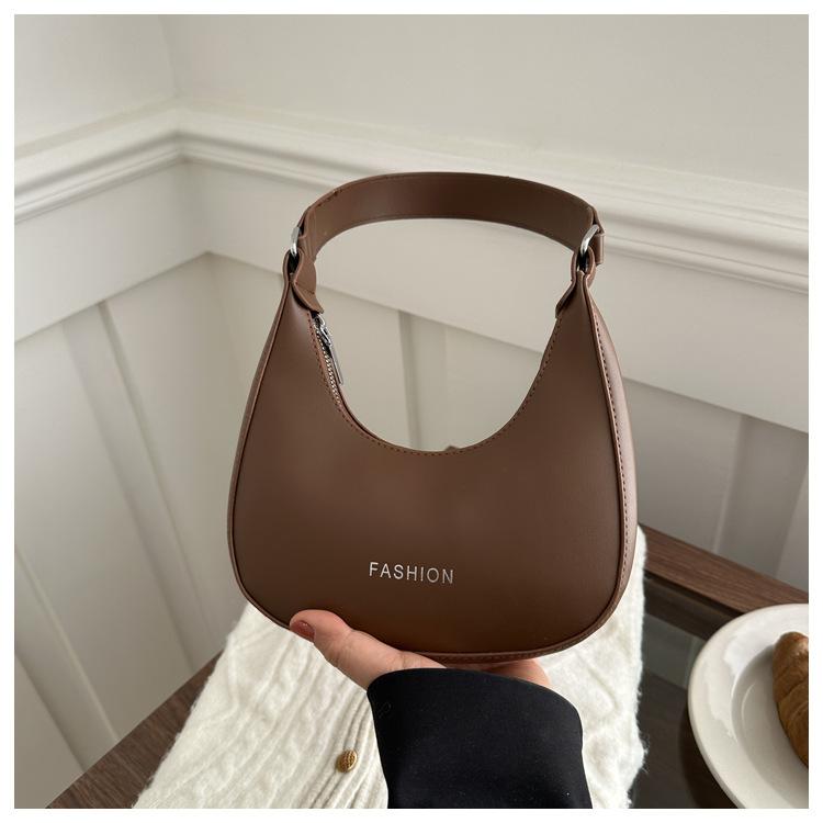 2024 Новая женская сумка для подмышек, женская сумка Niche Design, высококачественная однотонная сумка через плечо, женская мягкая сумка для покупок для девочек