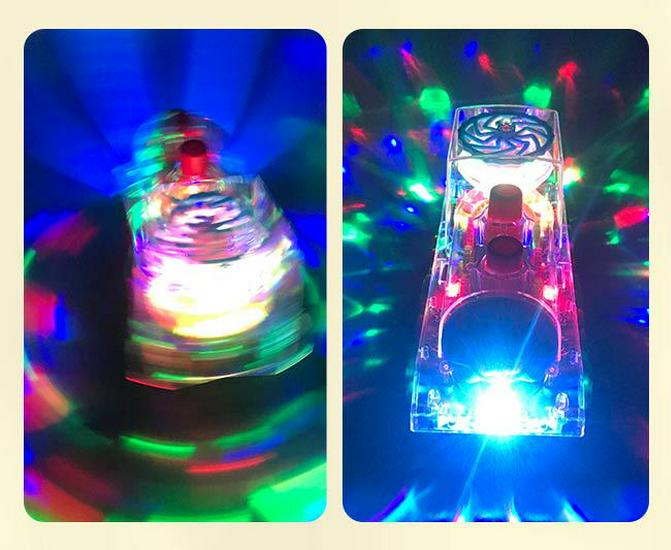 Transparent Musical Rotating Locomotive Toy with Universal Driving and Gear Linkage