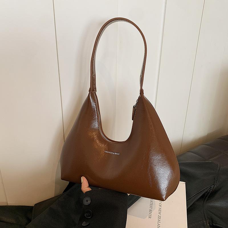 Сумка-пельмень из высококачественной фактуры в стиле ретро, универсальная маленькая сумка для поездок на работу, женская сумка на осень и зиму 2024 года, новая сумка через плечо