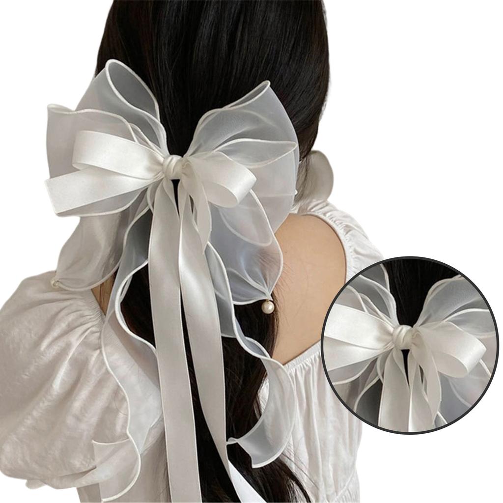 Нежная заколка для волос в виде вуали с бантом и бусинами. Добавьте нотку изысканности в свою прическу с помощью нежной заколки для волос.