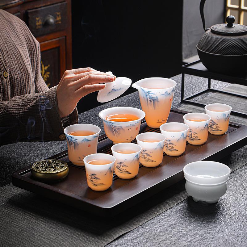 High-end tea set Dehua ice suet jade porcelain 11 heads bright ice and snow white tea landscape home business souvenir