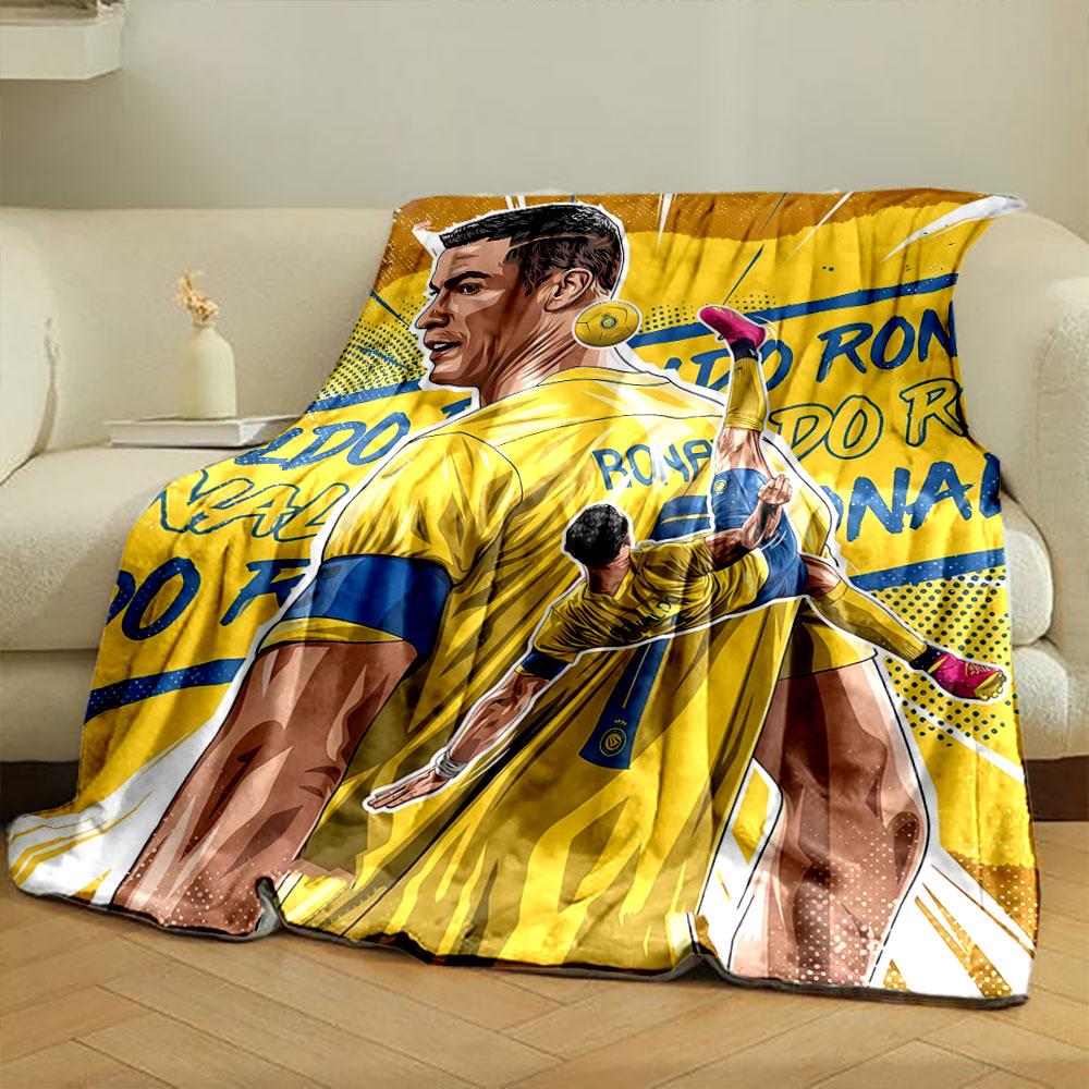 A dynamic soccer-themed illustration with bold yellow and blue colors. for all seasons blanket lunch break throw gift