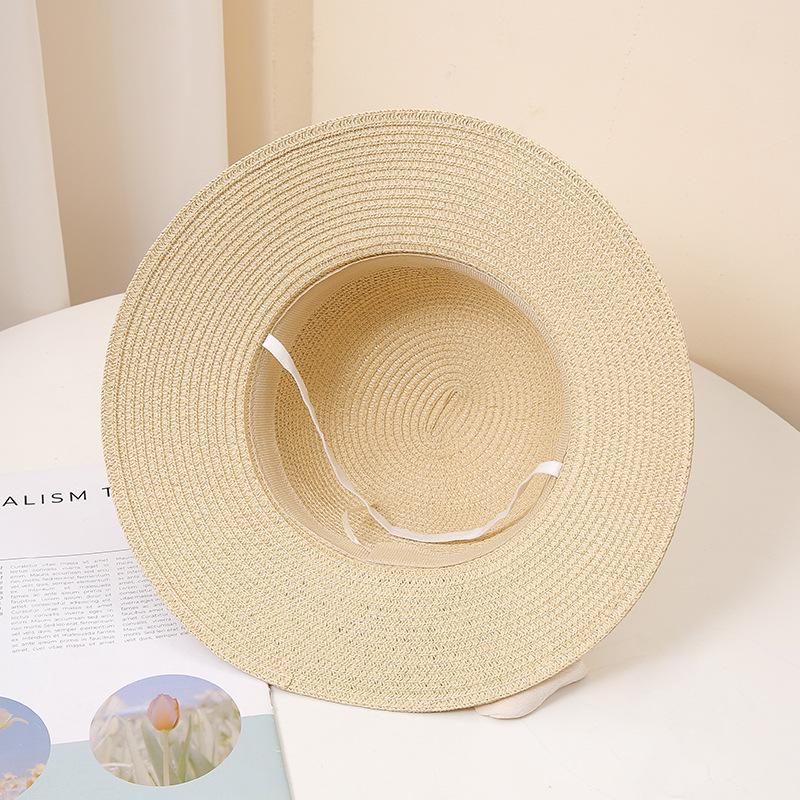 Женская широкополая соломенная шляпа от солнца с элегантным черным бантом, однотонная пляжная шляпа для летних путешествий, классическая защита от ультрафиолета на открытом воздухе