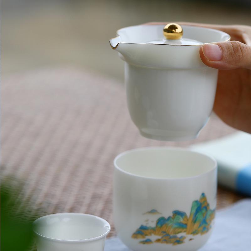 Suet jade porcelain gold-painted thousands of miles of Jiangshan travel tea set, convenient express cup, one pot and three cups, company souvenir
