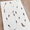 Elegant Maillard Brown Tiger Eye Stone Necklace with Snake Bone Chain - High-End Niche Metal Long Sweater Chain for Women
