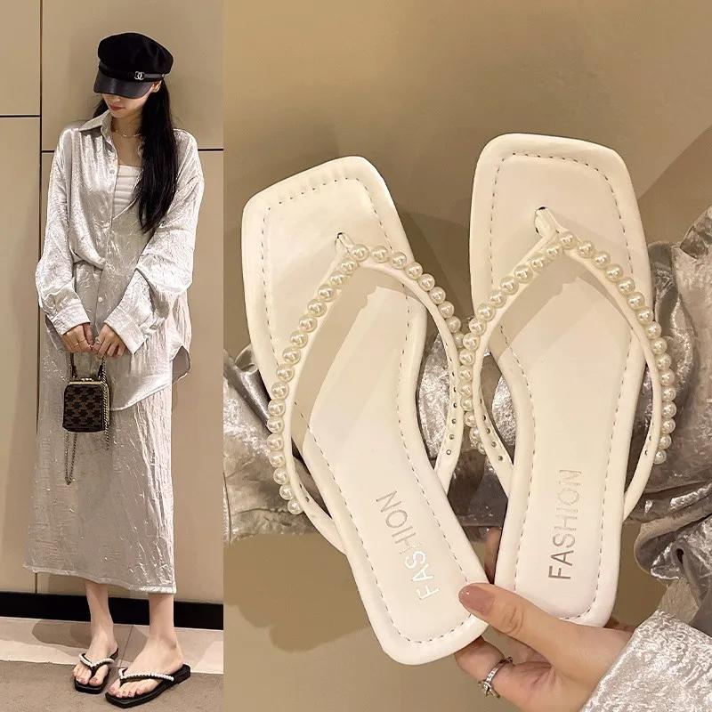 Мода 2024 Новая мода Горячая распродажа Женские шлепанцы Сланцы Носок-петля Носить Отделка бисером Однотонный Удобный Универсальный Повседневный Zapatos