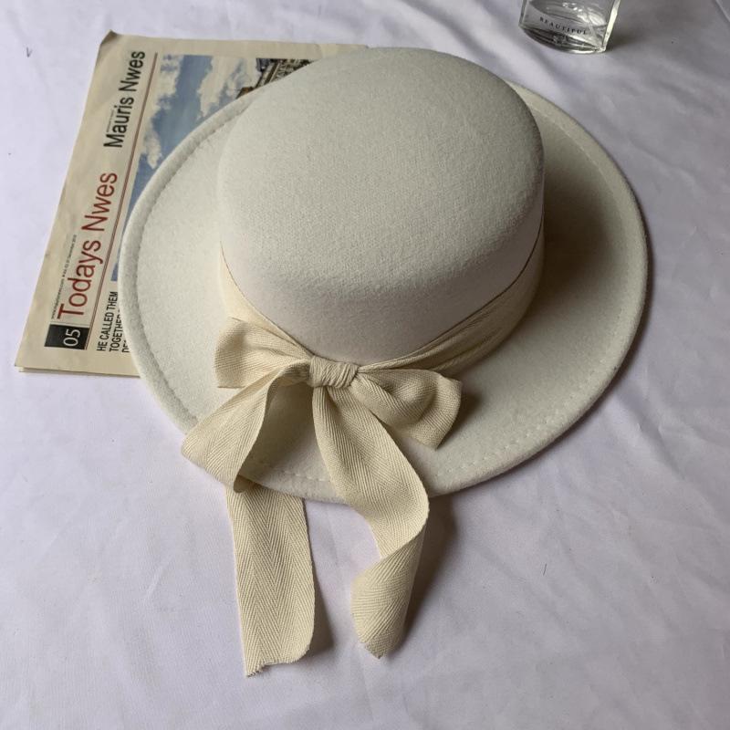 Bow strap flat top woolen hat women's autumn and winter British retro fashion versatile streamer big brim felt top hat