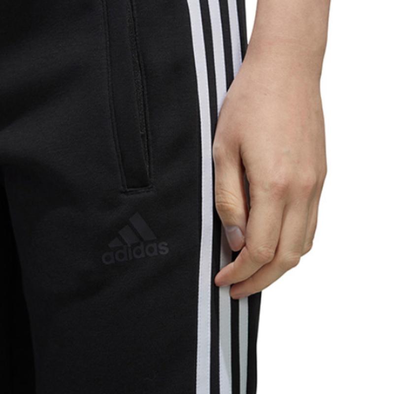 adidas Повседневные спортивные тренировочные зауженные трикотажные спортивные штаны женские низы черного цвета EH3896