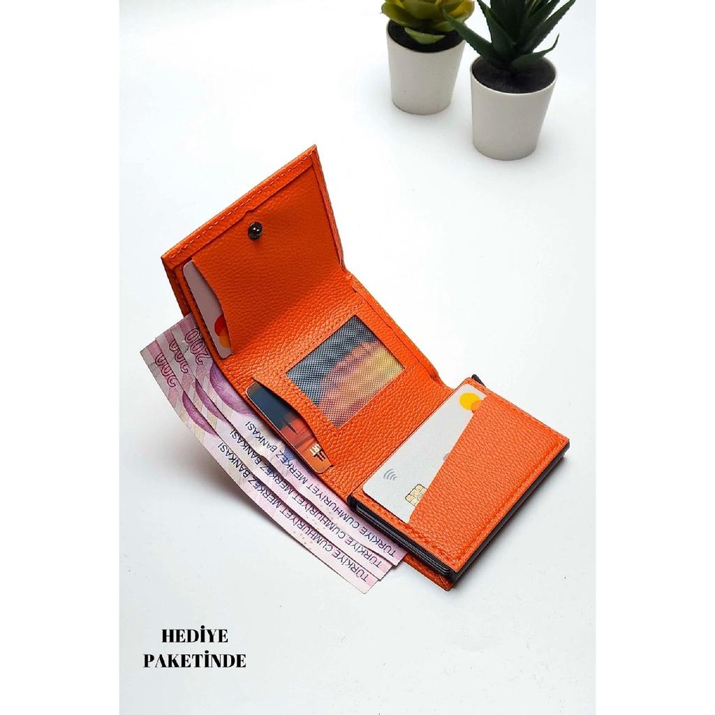 Оранжевый кошелек из веганской кожи унисекс с отделением для денег и держателем для карт с автоматическим механизмом. Подарочный пакет для портфолио?