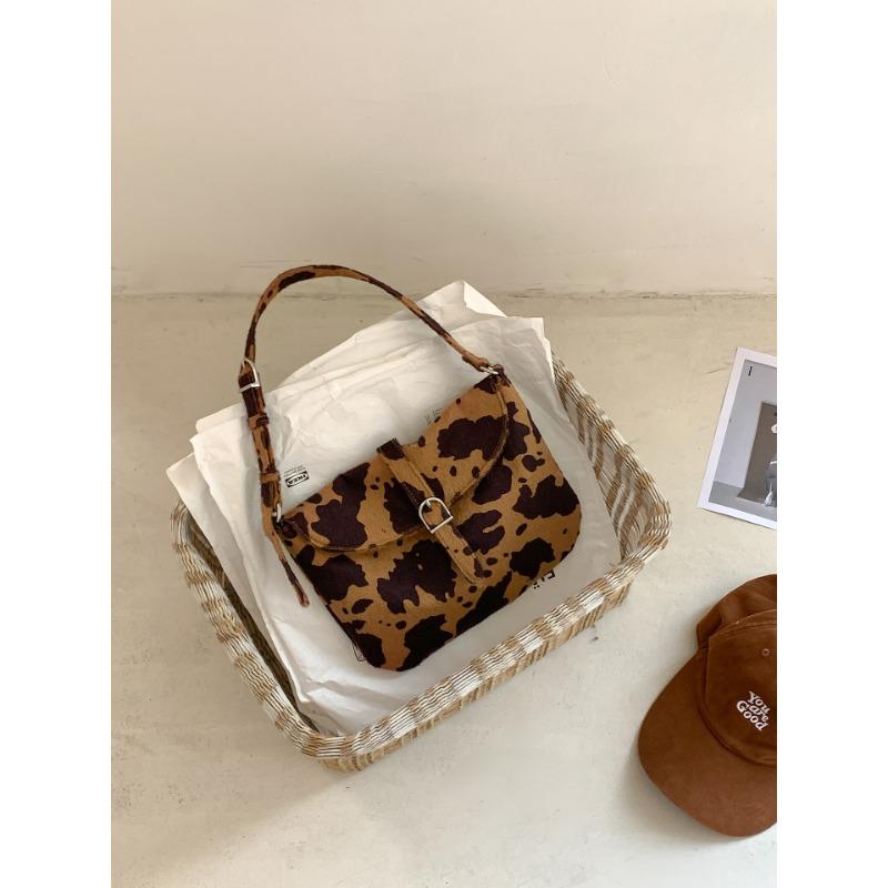 Осень и зима новая сумка через плечо женская модный тренд портативная женская сумка нишевый дизайн чувство коровьего принта сумка подмышку женская