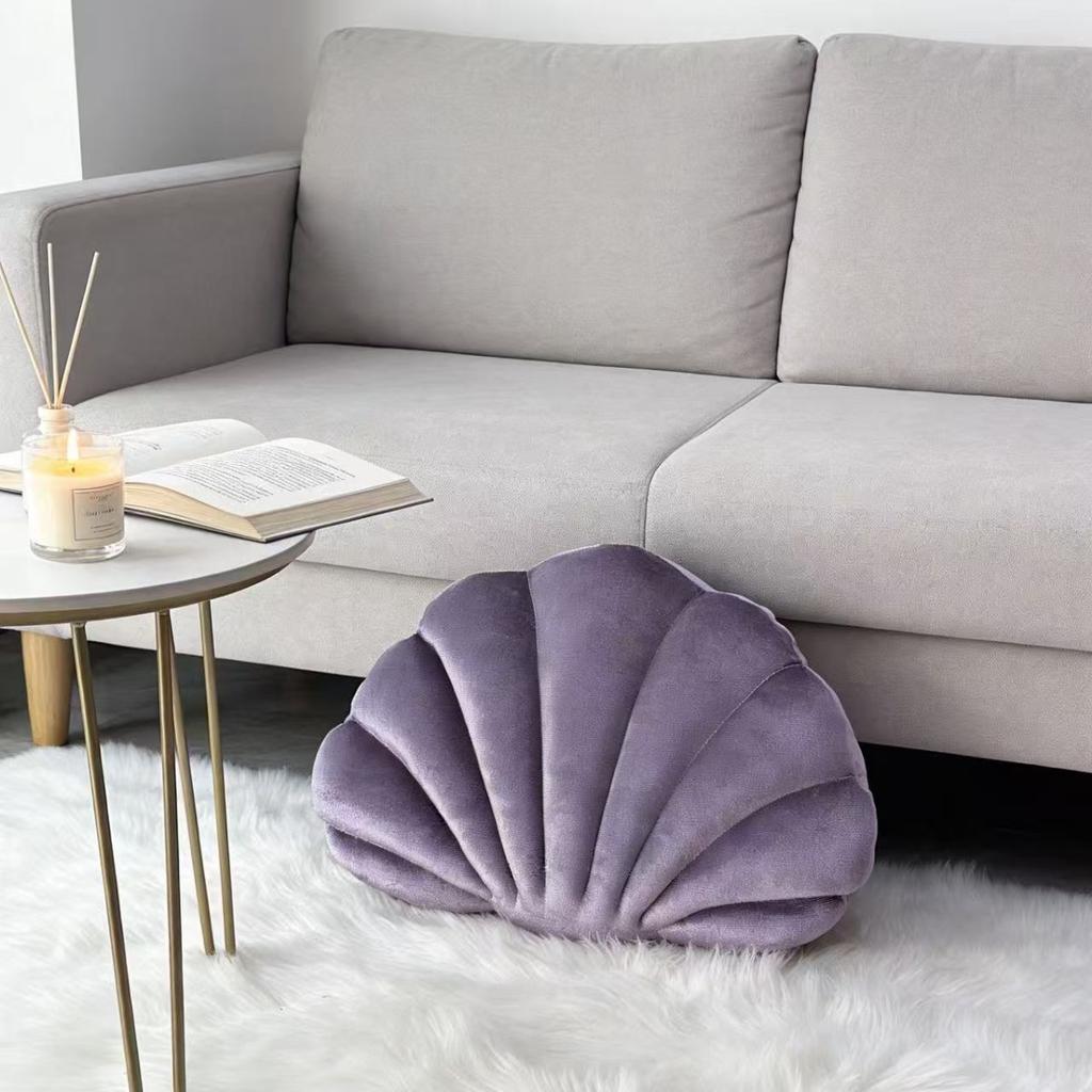 A seashell-shaped pillow, suitable for living room sofas, bedrooms, offices, and home decor.
