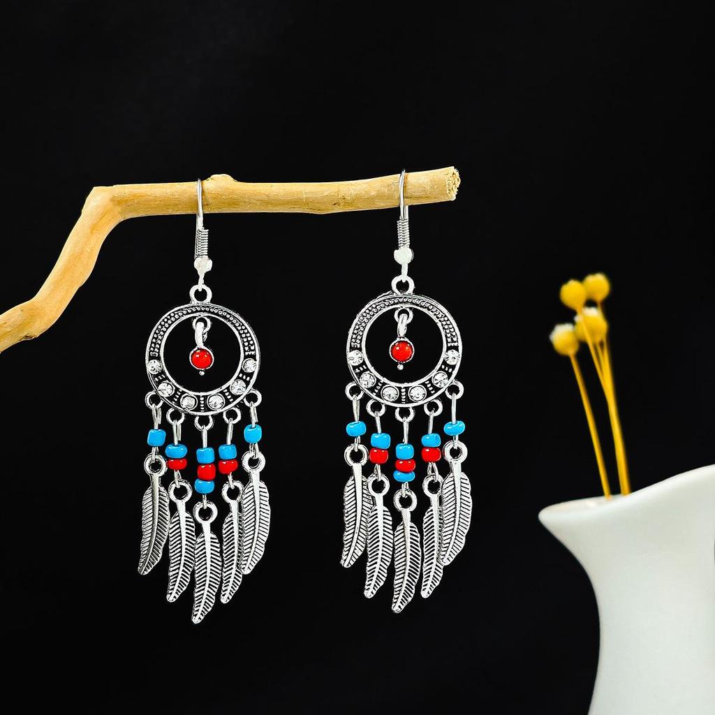European and American Retro Hollow Turquoise Tassel Bohemian Earrings for Women