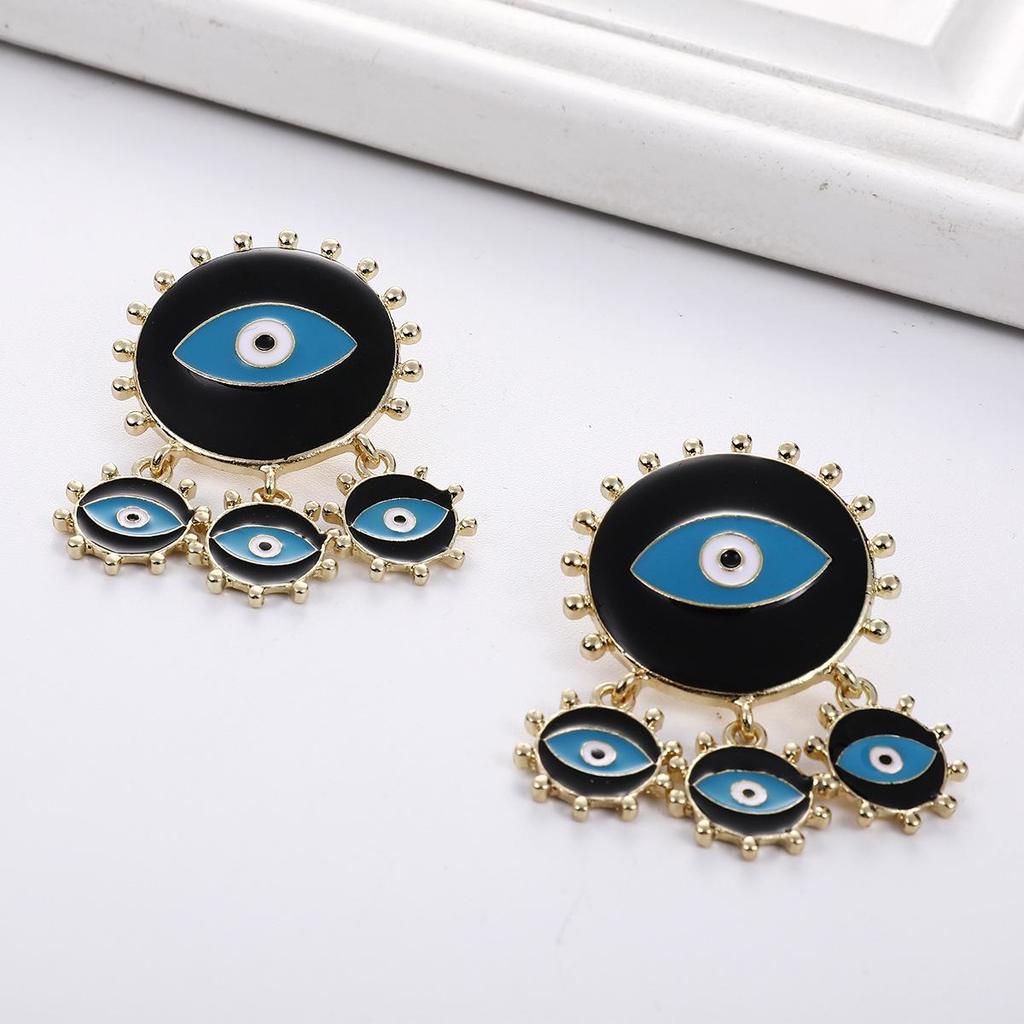 Devil's Eye Drip Oil Alloy Earrings: Trendsetting European & American Street Style