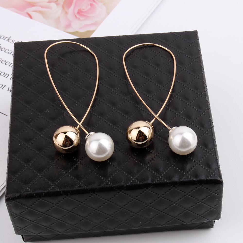 Минималистичные двусторонние серьги ручной работы из металла и жемчуга