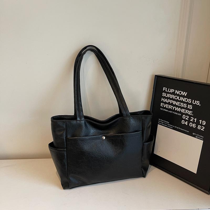 2025 лето новая зарубежная темпераментная простая сумка-тоут большой вместимости модный тренд женская повседневная сумка через плечо