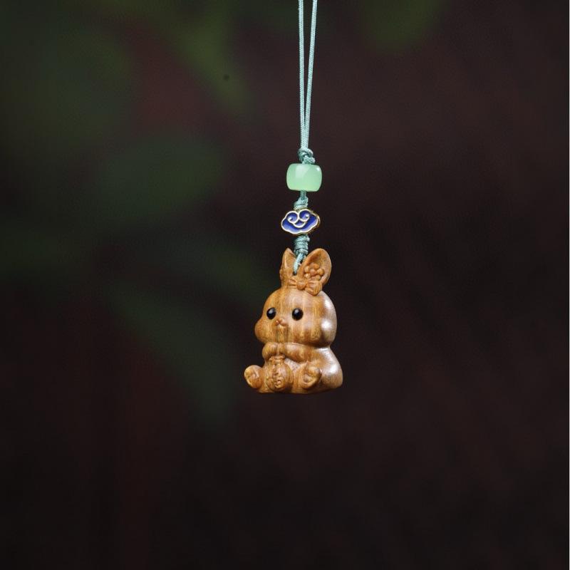 Twelve Zodiac Animal Charms Green Sandalwood Set: Rat, Ox, Tiger, Rabbit, Dragon, Snake, Horse, Sheep, Monkey, Rooster, Dog, Pig.