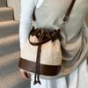 Hot Sale Contrasting Color Splicing Straw Pumping Bucket Bags Fashion Versatile Premium Holiday Wind Crossbody Women's Bags