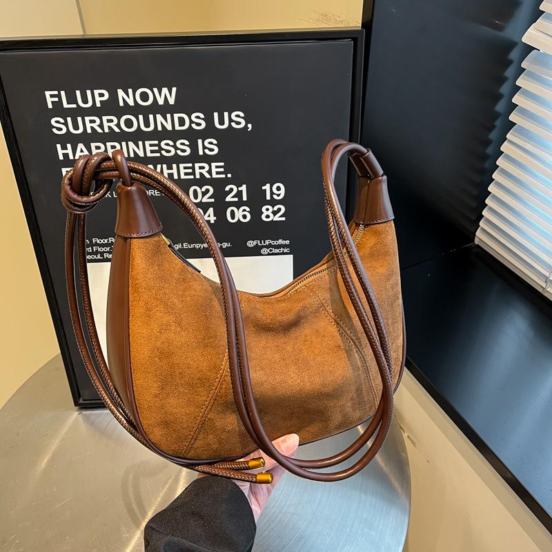 Премиальный сенс кэжуал ретро 2025 новые трендовые женские сумки рога пельмени сумки подмышку простые для работы большая вместимость