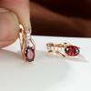Rose Gold Rangli Sirg'alar Oval Kesimli Qizil Oq Qora Toshli Ayollar To'y Zargarlik Buyumlari Ayollar uchun Hashamatli CZ Tirnoqli Sirg'alar Osma Sirg'alar