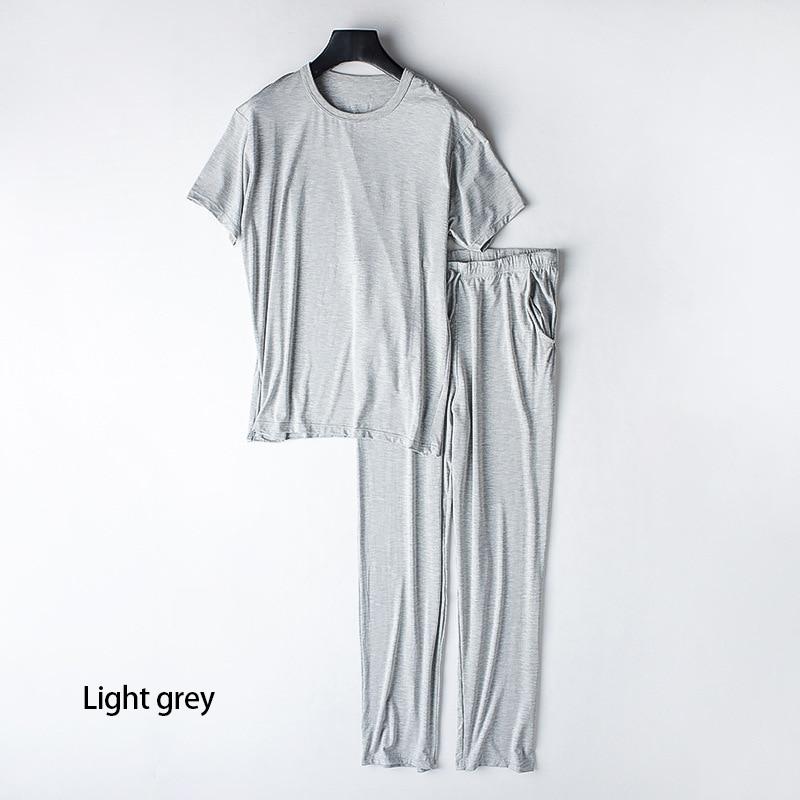 Men's Spring and Summer New Modal Pajamas Two-piece Short-sleeved Trousers Thin Large Size Loose Sports Home Wear Suit Sleepwear