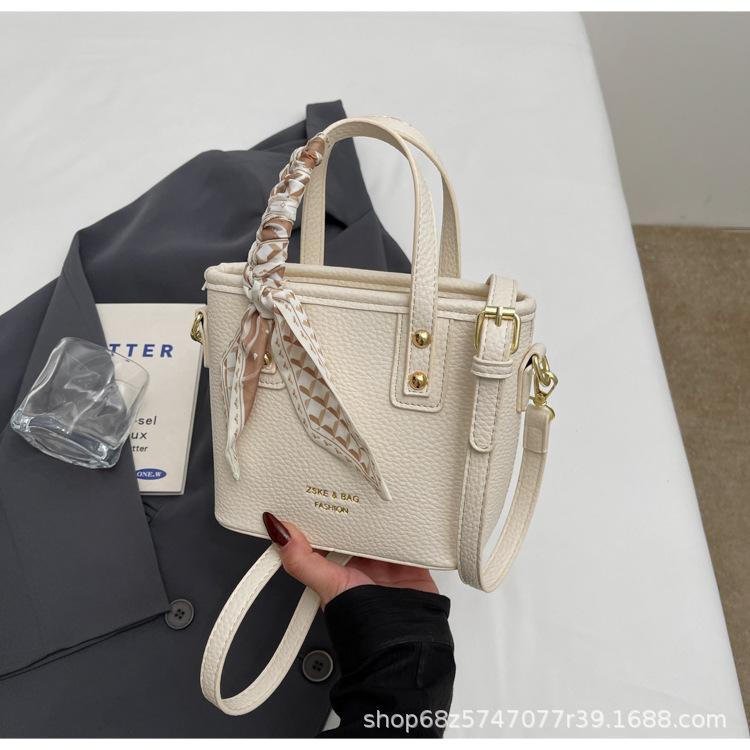 Fashion and High-quality Lychee Pattern Temperament Casual Portable Bucket Bag Women's Versatile Commuting Niche Solid Color PU Messenger Bag