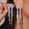European and American Versatile Bow Long Fringed Earrings, Fashionable and Shiny Rhinestone Stud Earrings.