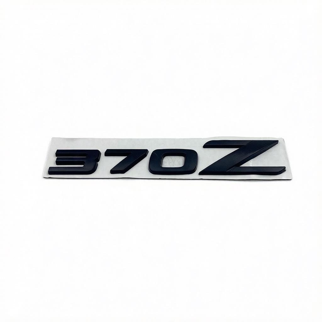 Комплект для модификации Nissan Z: Металлический корпус 350Z, Шильдик на багажник 370Z, Эмблема Z на багажник и Наклейка Z на боковую дверь